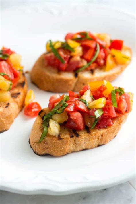 Bruschetta dip in an italian bread bowl recipe food network kitchen food network from food.fnr.sndimg.com cut the slices of bread in half and toast them on both sides until golden brown and crispy. Fresh Tomato Recipes for Seasonal Summer Eating | Family ...