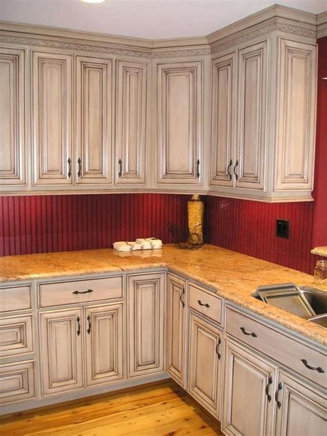 Take a look at this picture. Image result for how to darken pickled oak cabinets