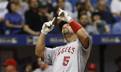 A year after signing pujols, moreno. Pujols Likely To Miss Rest Of Season Following Knee ...