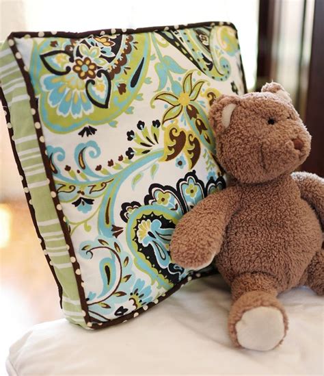 Upholstered— upholstered chairs have a soft, comforting fabric for a beautiful look and feel. love this pillow!!! lots of fun stuff for baby rooms! http ...