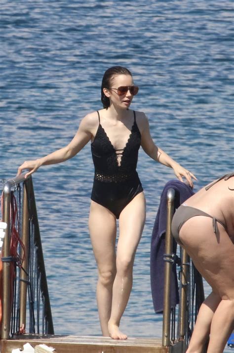 Lily Collins At The Beach Famous Nipple