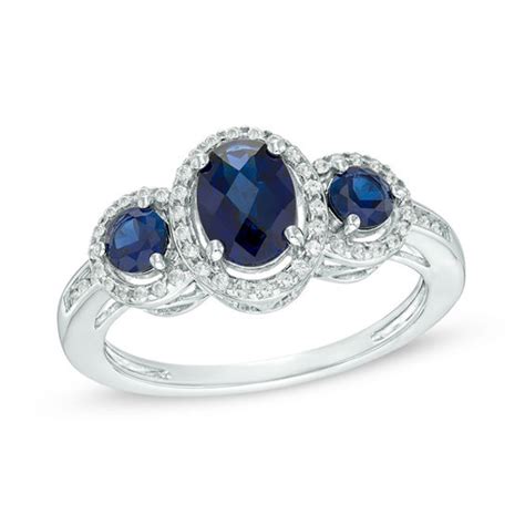 Oval Lab Created Blue And White Sapphire Frame Three Stone Ring In