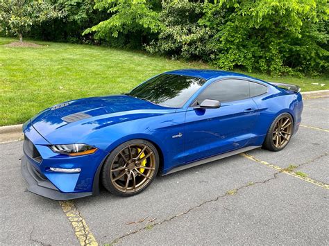 I want those wheels so bad for the rx7. Blue Ford Mustang GT with bronze wheels | Ford mustang gt ...