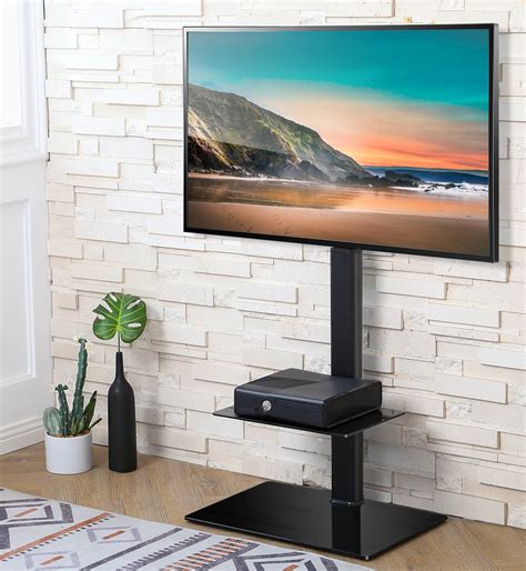 Tv height from floor calculator. FITUEYES Height Adjustable Black Floor TV Stand for TVs up ...