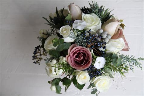 The great thing about carnations is they never go out of season. The Flower Magician: Winter Hedgerow Gathered Wedding Bouquet