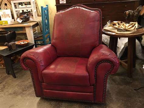 The ability to rock or recline allows you to relax in whichever way you feel more inclined. Cowboy Red 100% Top Grain Leather Swivel Recliner Made In USA