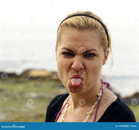 woman sticking her tongue out royalty free stock image 38324104