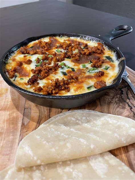 [homemade] queso fundido melted cheese with chorizo r food
