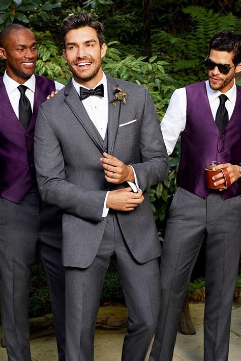 Groom And Groomsmen In Coordinating Tux Styles Tuxedo Wedding Purple