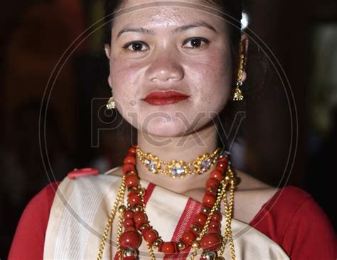 Image Of Assamese Woman In Traditional Assam Clothes During Bihu