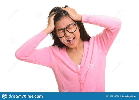 Young Beautiful Asian Woman Looking Frustrated And Stressed Stock Photo