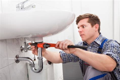 Portrait Of Male Plumber Fixing A Sink Stock Photo Image 34955154