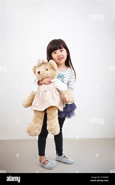A Girl Holding Teddy Bear Stock Photo Alamy