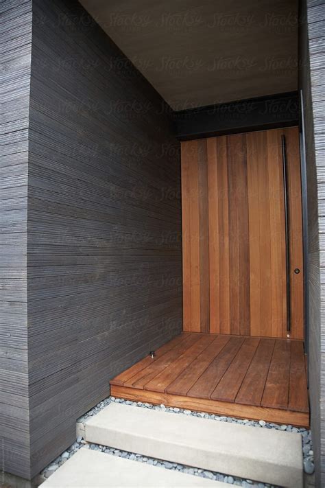 Wood Door Entrance Of Luxury Modern Design Home By Stocksy Contributor Trinette Reed Wood