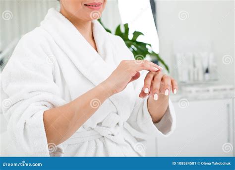 Mature Woman Using Cosmetic At Spa Stock Image Image Of Care