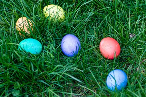 Easter Eggs In A Grassy Lawn Holiday Photos Creative Market