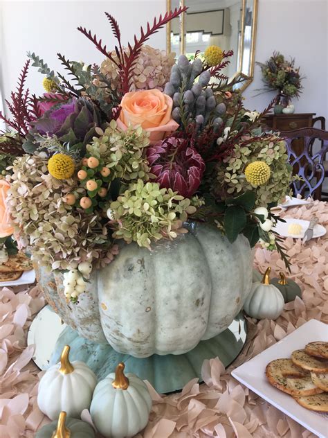 fall centerpieces for table with pumpkins