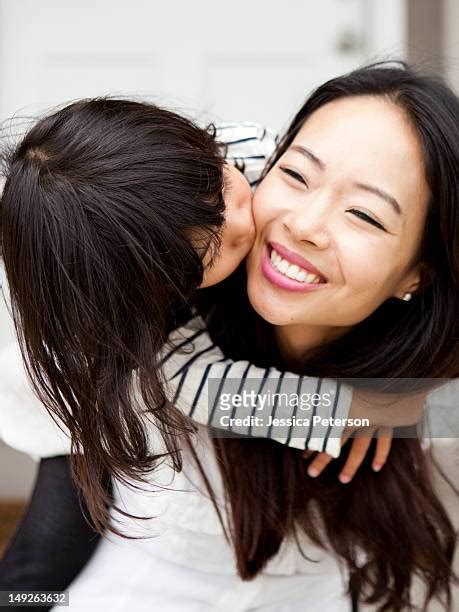 two asian girls kissing photos and premium high res pictures getty images