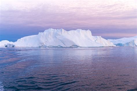 Under The Midnight Sun Iceberg Sightseeing In Ilulissat Atlas And Boots