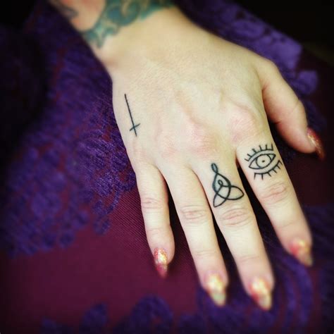 Cross tattoos are highly regarded all around the world. Pin by Anna Hosick-Kalahan on Tattoos | Cross finger ...