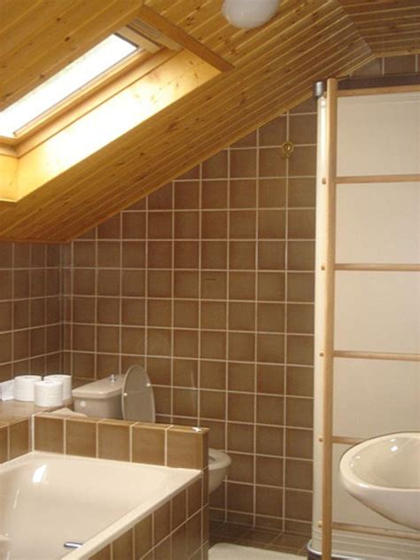 Bathroom design tips and ideas. Contemporary Bathroom With Slanted Wood Ceiling / design ...