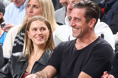 aaron rodgers celebrates his 39th birthday courtside with daughter of milwaukee bucks owner