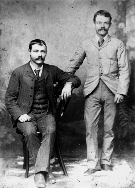 Dumb hairstyles of the 1970s. File:StateLibQld 2 139509 Two men posing for a portrait ...