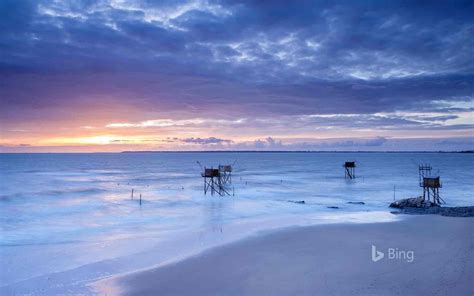France Beach In Front Of A Sunset 2017 Bing Wallpaper Preview
