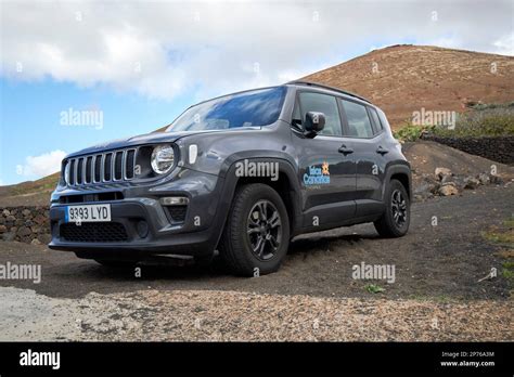 Jeep Renegade Hire Car Off Road On Dirt Road Beneath A Volcano In