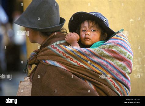 Peruvian Woman Carrying Child On Hi Res Stock Photography And Images