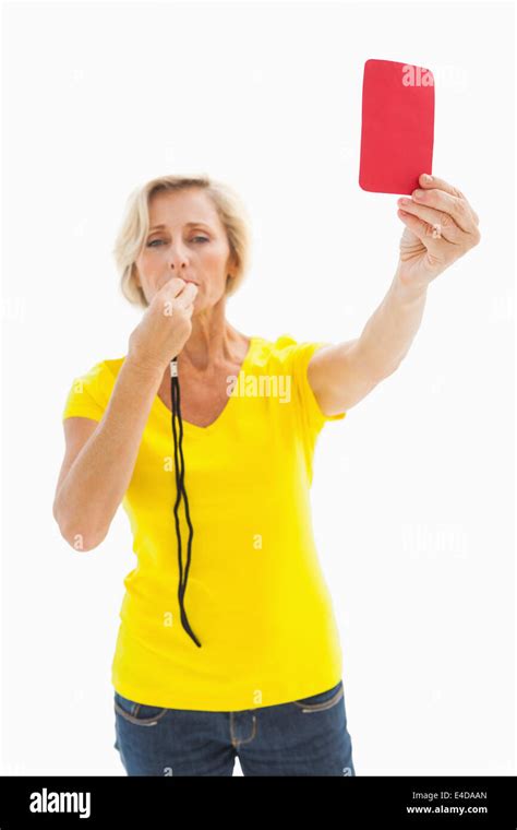 Mature Blonde Showing Red Card To Camera Stock Photo Alamy