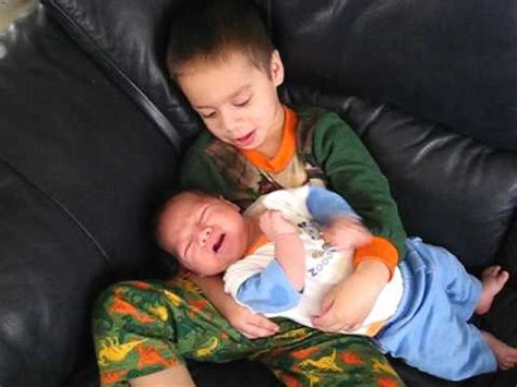 Big Brother Holds Baby Brother YouTube