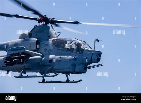 A Us Marine Corps Ah 1z Viper Attack Helicopter With Marine Light