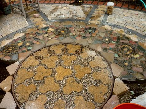 If you're undecided about the best size for your. DIY Paver and Pebble Mosaic Patio | The Owner-Builder Network