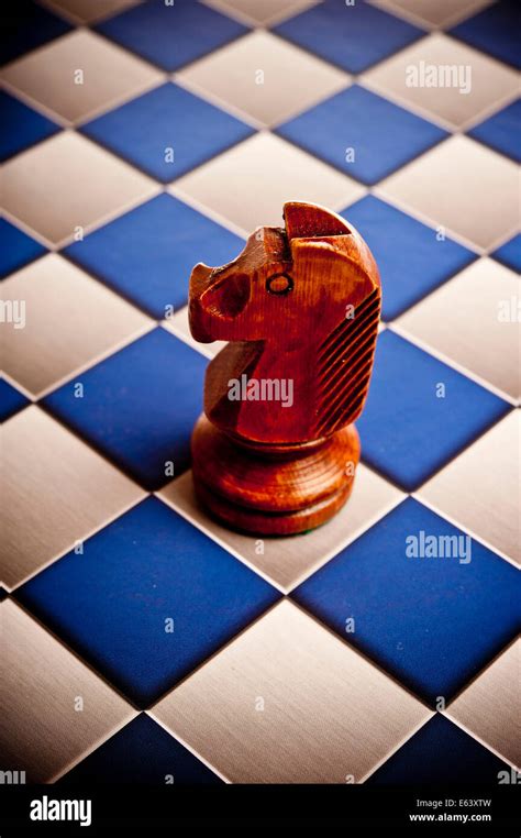 Knight Chess Piece On A Chessboard Stock Photo Royalty Free Image