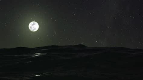 A View Overlooking Gentle Waves On The Ocean Underneath A Moonlit Sky