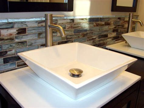 A vanity top with attractive backsplash not only increases the beauty of your bathroom but also makes it more comfortable to work on. 20 Eye-Catching Bathroom Backsplash Ideas