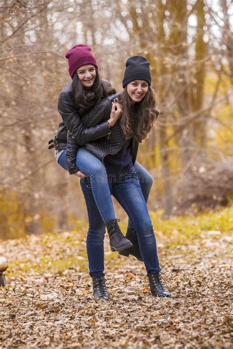 Two Girls Having Fun In Autumn Park Stock Image Image Of School