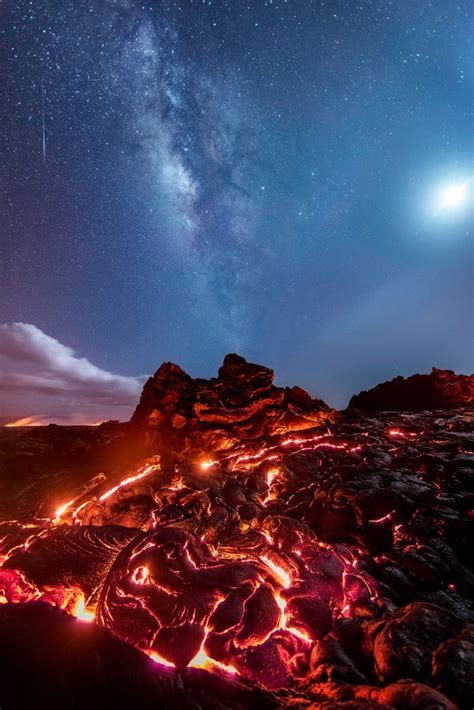 Meteor Streaks Across The Milky Way Above Lava Fields Volcanoes