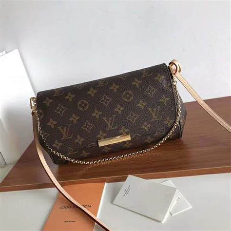 Louis Vuitton Lv Women Favorite Mm Clutch In Monogram Coated Canvas