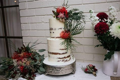 Using a spoon, drop some ganache from the sides of the cake and allow it to drip. Wedding cake with fresh native Australian flowers Www.cakesbycandib.com.au | Wedding flower ...