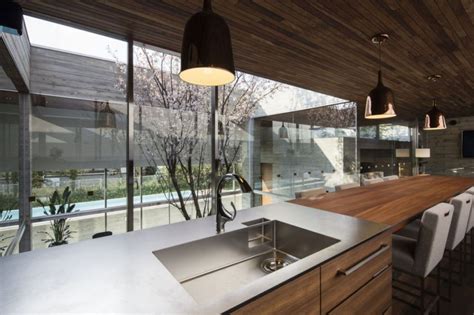 Typical modern japanese houses have slanted roofs and very simple designs both inside and outside. Building Your Own Japanese Style House - MidCityEast