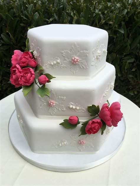 Which style of cake should you choose? hexagon wedding cake sugar peonies | Cakes for Celebrations