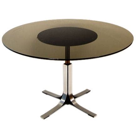 The base is crafted from solid acacia wood, and has three sled legs that meet in the center for a bold, structural look. Adjustable Dining / Coffee Table at 1stdibs