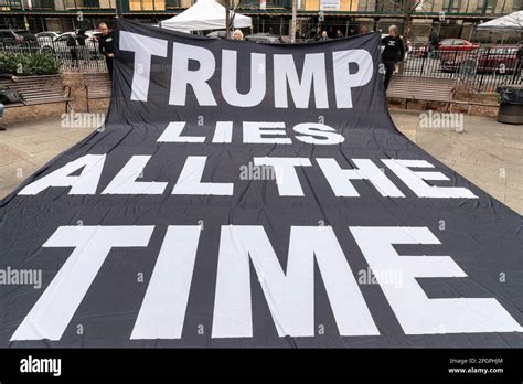 Handful protesters outside of Manhattan Criminal Court in New York on