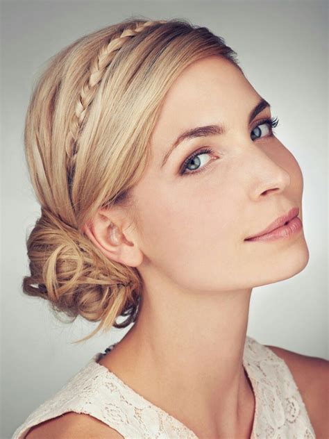 I love the twisting because it makes all hair look as thick as can be. Messy side bun with braid | Long hair styles, Braided ...