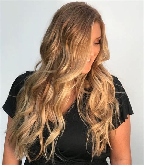 The brown underneath is dark and matte while the highlights simply look like molten gold: 25 Prettiest Hair Highlights for Brown, Red & Blonde Hair