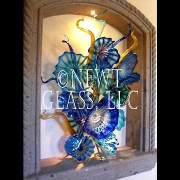 The vases perfectly support a bouquet for easy arranging and look equally appealing when empty. Decorative Glass Wall Art Plates | Colorful Blown Glass ...