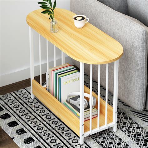 The table legs are equipped with four pulleys and a grid storage basket, which is suitable for offices, homes, schools, and homes. Coffee table simple movable sofa side table home living ...