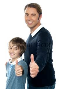 Confident Father And Son Duo Gesturing Stock Image Colourbox